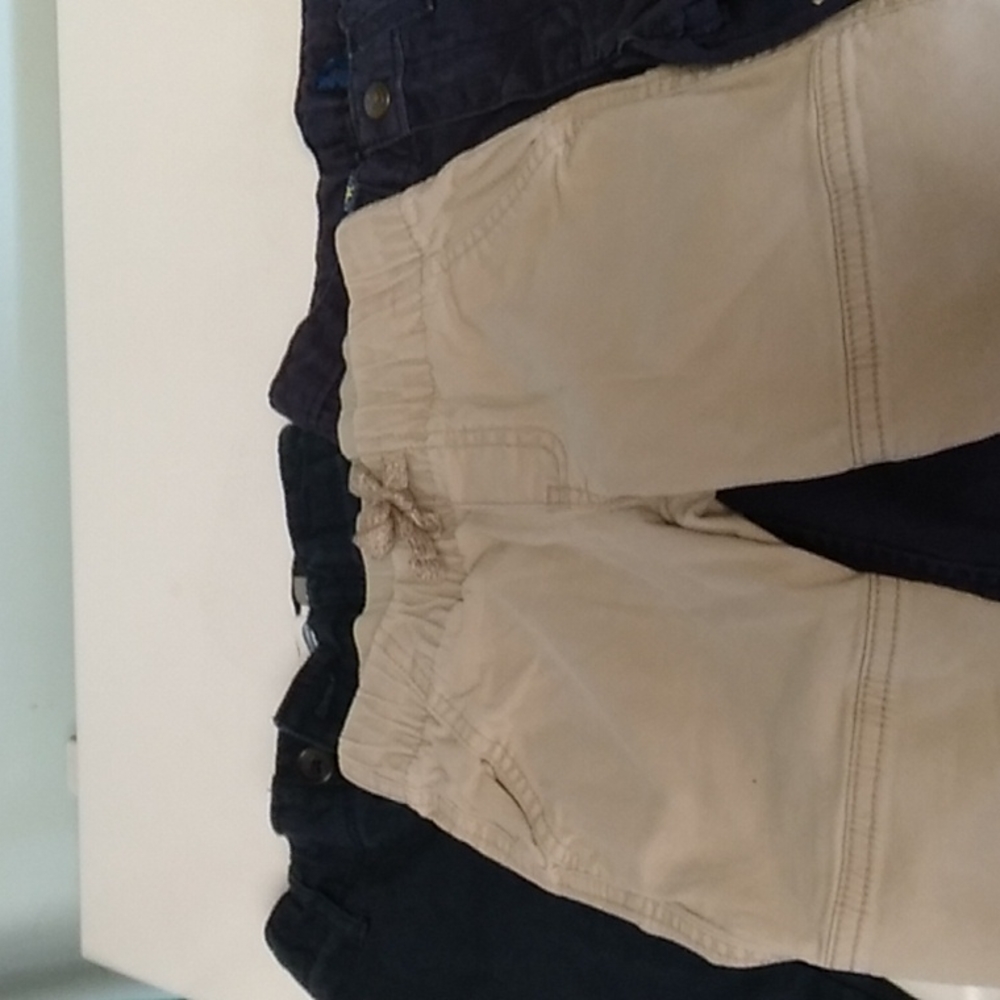 Three pairs size 4 pants (2 navy blue pants have adjustable waist)good condition